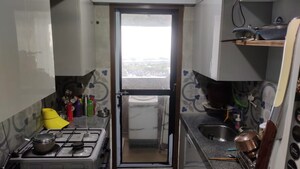 Kitchen in 2.5 BHK Apartment at Neumec Shreeji Towers, Wadala East – for Sale
