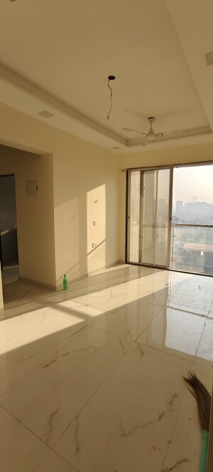 Living Room in 1 BHK Apartment at Amar Vinay Heritage, Mira Road – for Rent