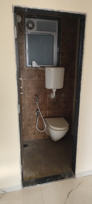 Bathroom in 1 BHK Apartment at Amar Vinay Heritage, Mira Road – for Rent