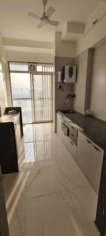 Kitchen in 1 BHK Apartment at Amar Vinay Heritage, Mira Road – for Rent