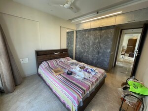 Bedroom in 2 BHK Apartment at Raunak Viraj Bliss, Khar West – for Sale
