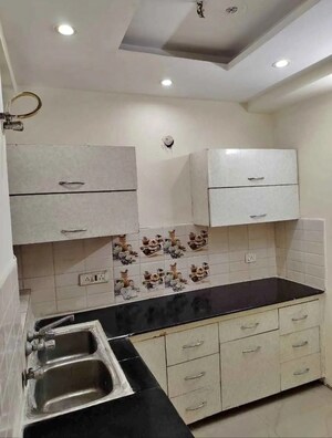 Kitchen in 2 BHK Apartment at Dhakoli – for Sale