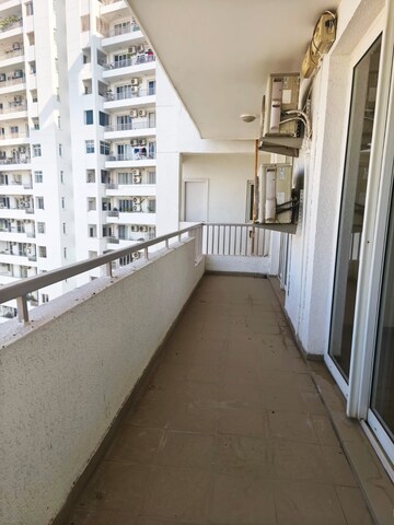 Balcony in 3.5 BHK Apartment at Emaar The Enclave, Sector 66 – for Rent
