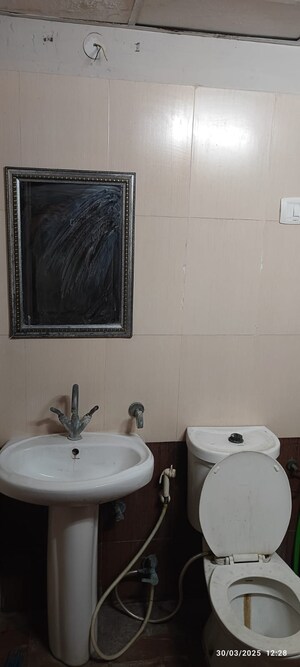 Bathroom in 3 BHK Apartment at Antriksh Golf View, Sector 78 – for Rent