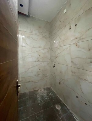 Bathroom in 2 BHK Apartment at Dhakoli – for Sale