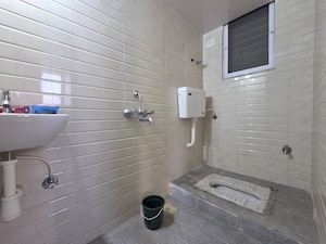 Bathroom in 1 BHK Apartment at Ganesh Nagar – for Sale