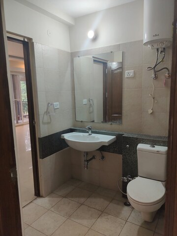 Bathroom in 3 BHK Apartment at ATS Golf Meadows, Central Derabassi – for Rent