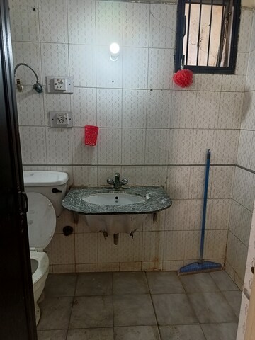 Bathroom in 2 BHK Apartment at Windsor and Nova Society, Ahinsa Khand 2 – for Rent