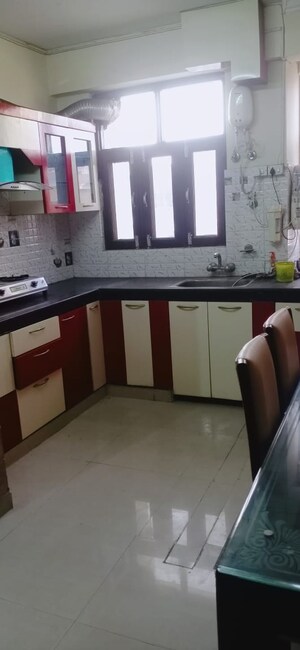 Kitchen in 2.5 BHK Apartment at Singh Tower, Vikas Nagar – for Rent