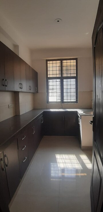 Kitchen in 3 BHK Apartment at Ramprastha Pearl Court, Vaishali Sector 7 – for Sale