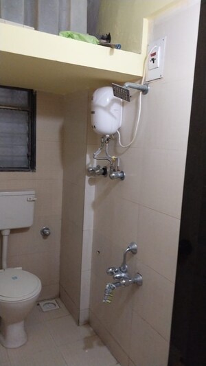 Bathroom in 1 BHK Apartment at Sneh CHS Andheri West, Andheri West – for Rent