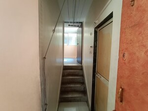 Building Lobby in 1 BHK Apartment at Seawoods Sector 50 – for Rent