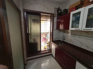 Kitchen in 1 BHK Apartment at Seawoods Sector 50 – for Rent