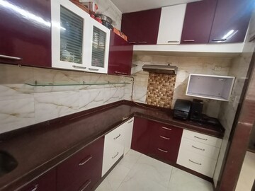 Kitchen in 1 BHK Apartment at Seawoods Sector 50 – for Rent