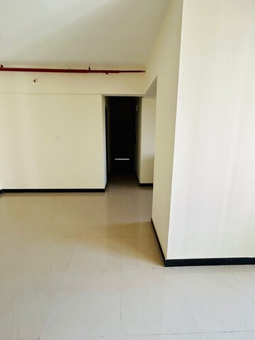 Room in 2.5 BHK Apartment at Sheth Vasant Lawns, Laxmi Nagar – for Sale