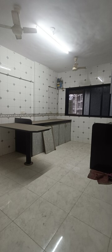 Kitchen in 3 BHK Apartment at Siddharth Nagar CHS, Borivali East – for Rent