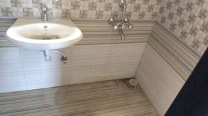 Bathroom in 2 BHK Apartment at Tilak Nagar – for Sale