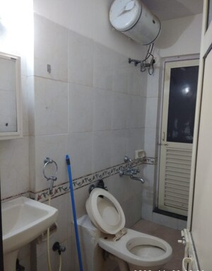 Bathroom in 1 BHK Apartment at K Raheja Palm Court, Malad West – for Sale