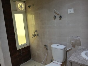 Bathroom in 3 BHK Apartment at Mahagun Mantra I, Sector 10 Greater Noida – for Rent