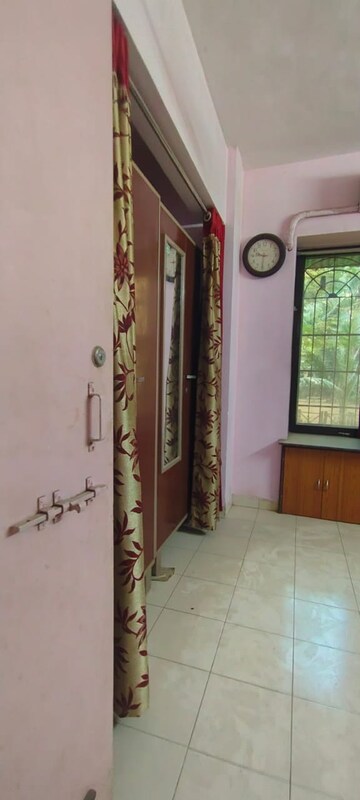 Living Room in 1 BHK Apartment at Vijay Nagri CHS Ltd Building No 11, Waghbil – for Rent