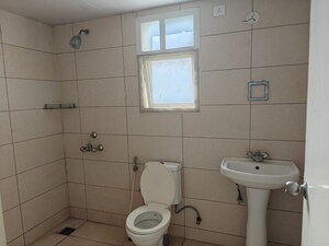 Bathroom in 3 BHK Apartment at Prestige Tranquility, Budigere – for Rent