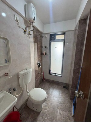 Bathroom in 1 BHK Apartment at Hariko Arihant Heights, Bhayandar East – for Rent