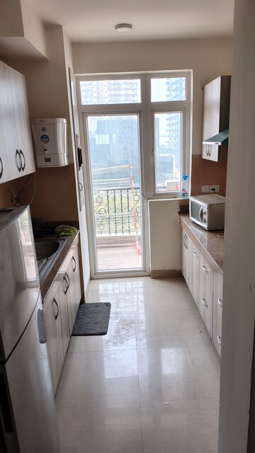 Kitchen in 3.5 BHK Apartment at Emaar Emerald Estate, Sector 65 – for Rent