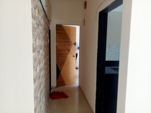 Building Lobby in 1 BHK Apartment at Vasudev Sky High, Mira Road – for Sale