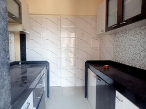 Kitchen in 1 BHK Apartment at RNA NG Vibrancy, Mira Road – for Sale