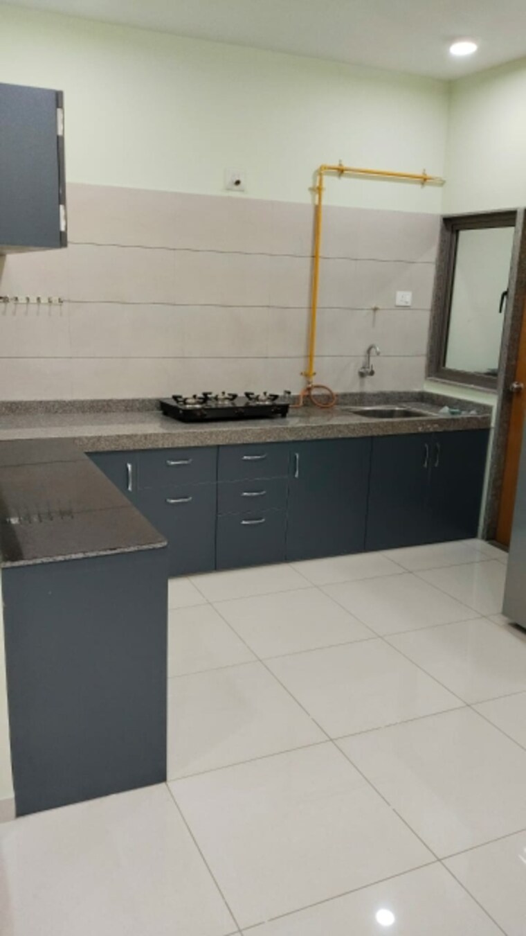 Kitchen, aaryan-aaviskaar 3 Bedroom 1500 Sq.Ft. Apartment In Shela Ahmedabad 9645995