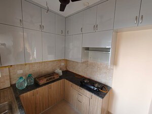 Kitchen in 3 BHK Apartment at Amrapali Crystal Homes, Sector 76 – for Rent