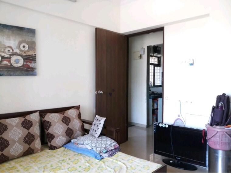 Living Room, raunak-unnathi-woods-phase-7-a-and-b 1 Bedroom 416 Sq.Ft. Apartment In Ghodbunder Road Thane 9646038