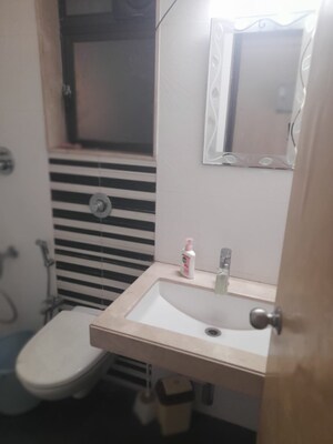 Bathroom in 1.5 BHK Apartment at Omkar Raga, Chembur – for Sale