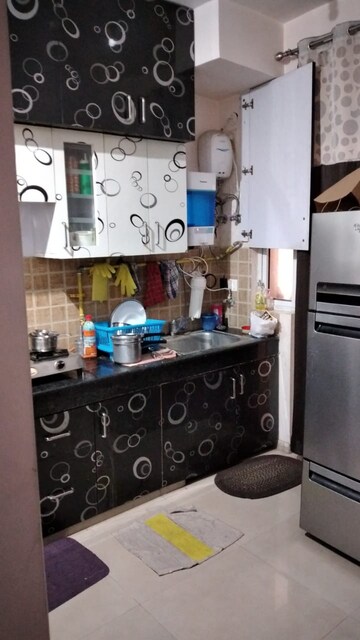 Kitchen in 2 BHK Apartment at Mahagun Mywoods, Sector 16c Greater Noida – for Rent