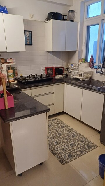 Kitchen in 2 BHK Apartment at NK Sharma Savitry Greens 2, Ghazipur – for Rent