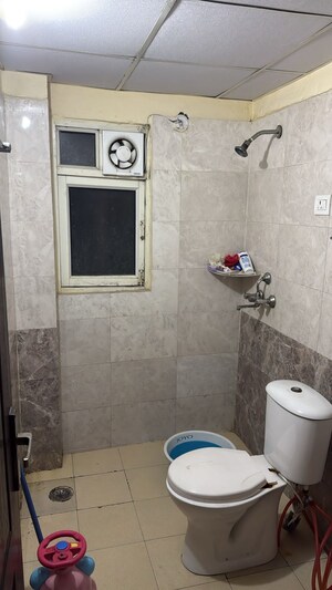 Bathroom in 3 BHK Apartment at Aims Golf Avenue I, Sector 75 – for Rent