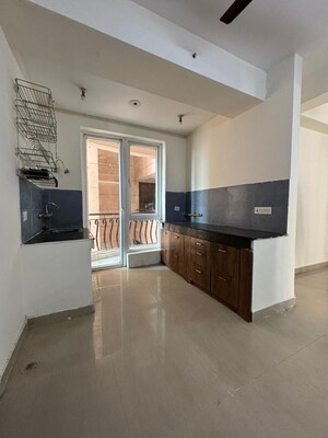 Living Room in 2 BHK Apartment at Sikka Karmic Greens, Sector 78 – for Rent