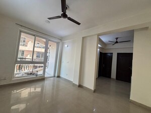 Living Room in 2 BHK Apartment at Sikka Karmic Greens, Sector 78 – for Rent