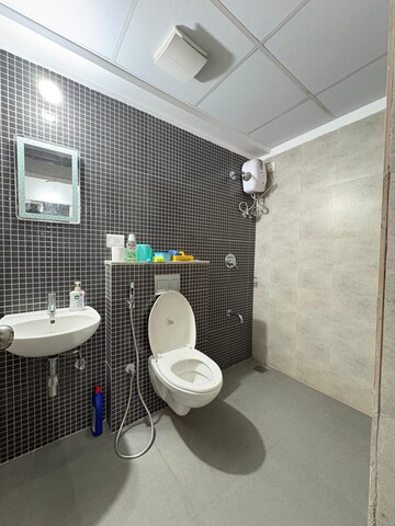 Bathroom in 2 BHK Apartment at Lodha Lakeshore Greens, Dombivli East – for Rent