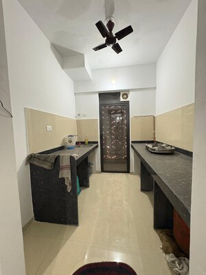 Kitchen in 2 BHK Apartment at Lodha Lakeshore Greens, Dombivli East – for Rent