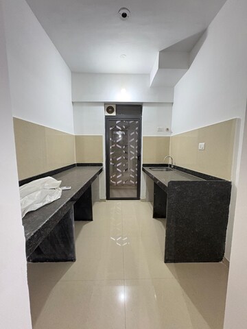 Kitchen in 2 BHK Apartment at Lodha Lakeshore Greens, Dombivli East – for Rent