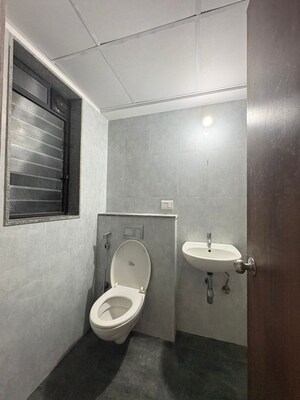 Bathroom in 2 BHK Apartment at Lodha Lakeshore Greens, Dombivli East – for Rent