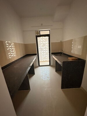 Kitchen in 2 BHK Apartment at Lodha Lakeshore Greens, Dombivli East – for Rent