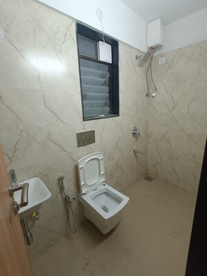 Bathroom in 2 BHK Apartment at Pratham ARC Aura, Andheri West – for Rent