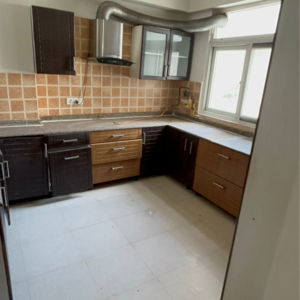 Kitchen in 4 BHK Apartment at Nirala Eden Park, Sector 51 – for Rent