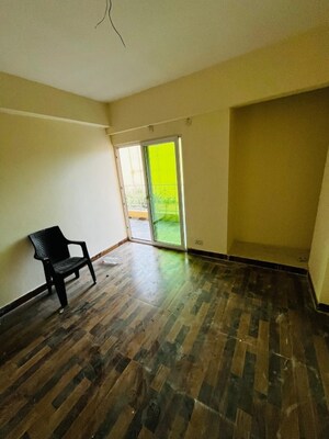 Room in 2 BHK Apartment at Charms Castle, Raj Nagar Extension – for Rent