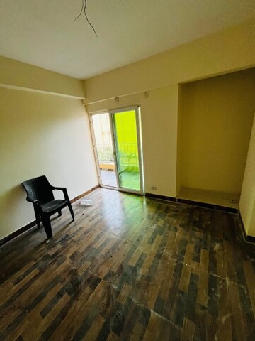 Room in 2 BHK Apartment at Charms Castle, Raj Nagar Extension – for Rent