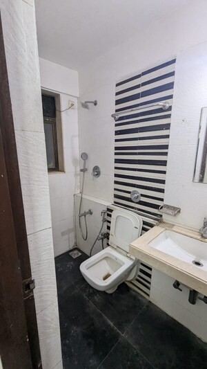 Bathroom in 2 BHK Apartment at Omkar Raga, Chembur – for Rent