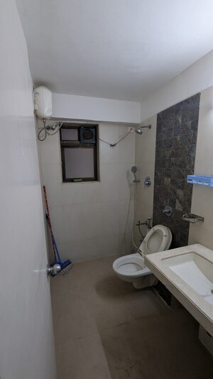 Bathroom in 2 BHK Apartment at Omkar Raga, Chembur – for Rent