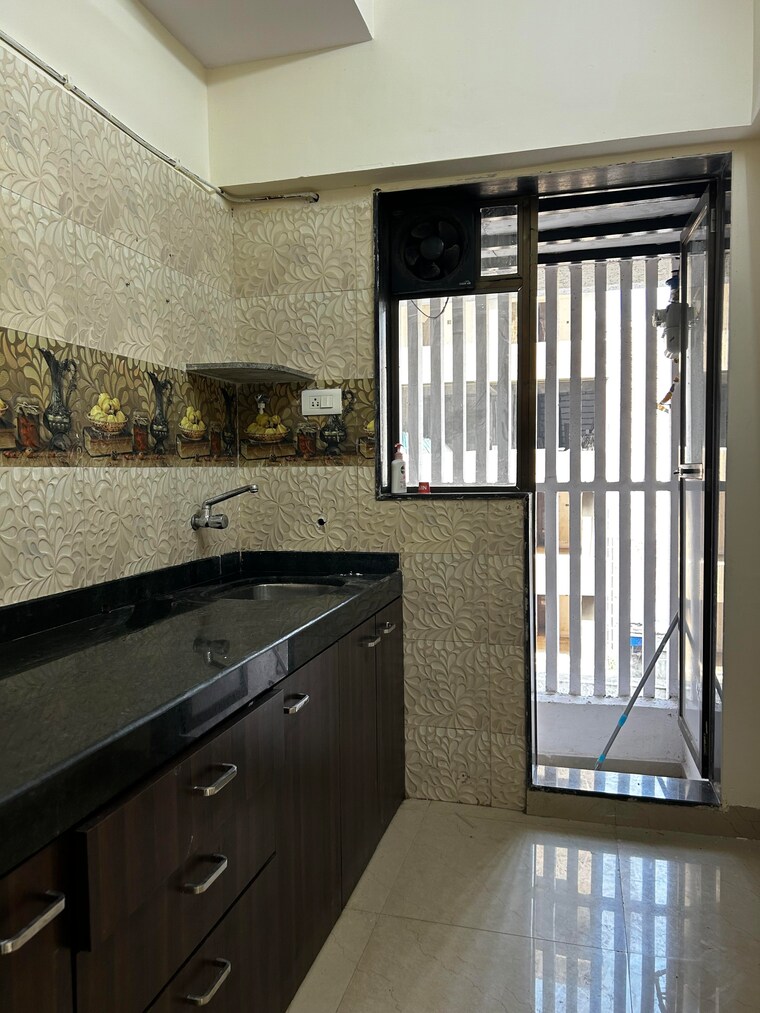 Kitchen, dn nagar 2 Bedroom 679 Sq.Ft. Apartment In Dn Nagar Mumbai 9646416